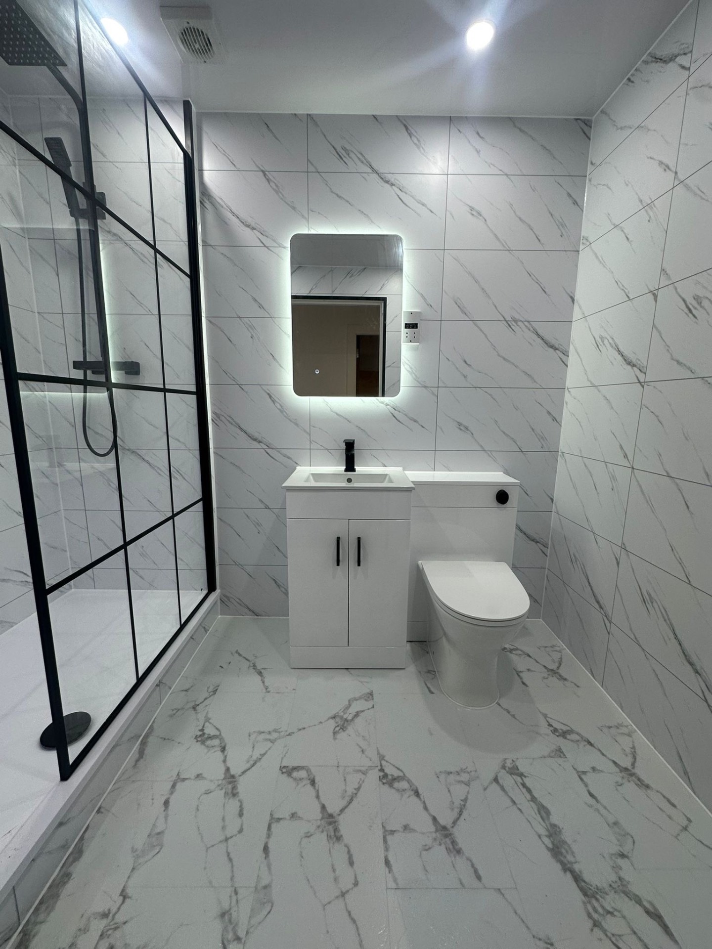 White marble with crittall shower