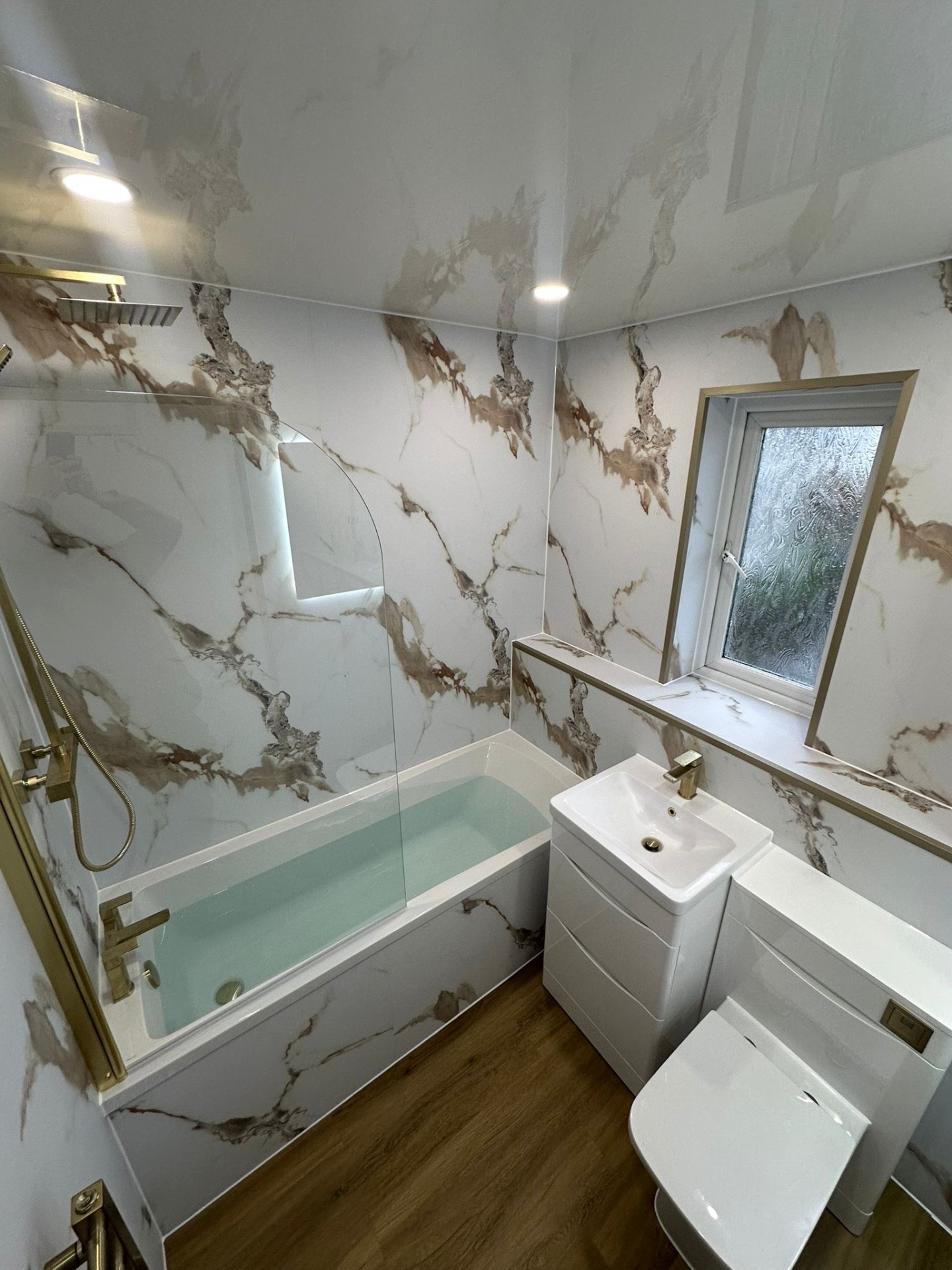 Gold marble bath suite